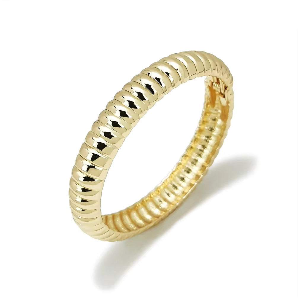 Plot Twist – Twisted Gold Bangle