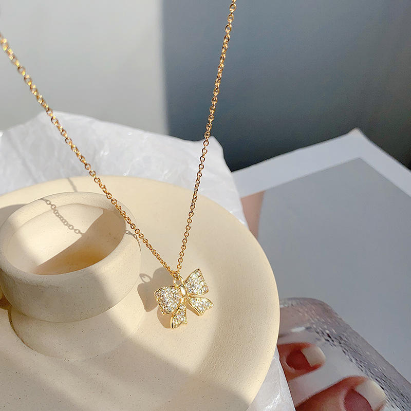 Bowtox - A Dainty Bow Necklace